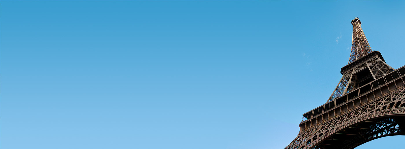 Cover image for The HomeScholar resource titled 'How to Teach Foreign Language to Homeschool Teens.' The design shows the Eiffel Tower against a clear blue sky, with The HomeScholar logo at the top and a blue banner that reads 'Learn to Plan High School Courses.